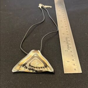 Vintage glass whale tail on 16” black cord